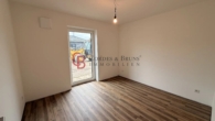 Zimmer 1 - Altersgerecht! Erstbezug im Neubau Erdgeschosswohnung mit 2-Zimmern und Wohnküche WE2 Haus 2