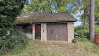Ansicht Garage Eingang OG (Einliegerwohnung) - Kernsanierungsbedürftiges Einfamilienhaus mit Sauna und Pool sowie Einliegerwohnung im OG