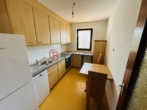 Küche mit Geräten - Schöne helle Wohnung mit Südloggia und TG Platz