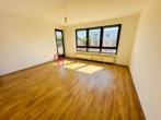 Wohnen - Schöne helle Wohnung mit Südloggia und TG Platz
