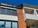 Südseite - Schöne helle Wohnung mit Südloggia und TG Platz